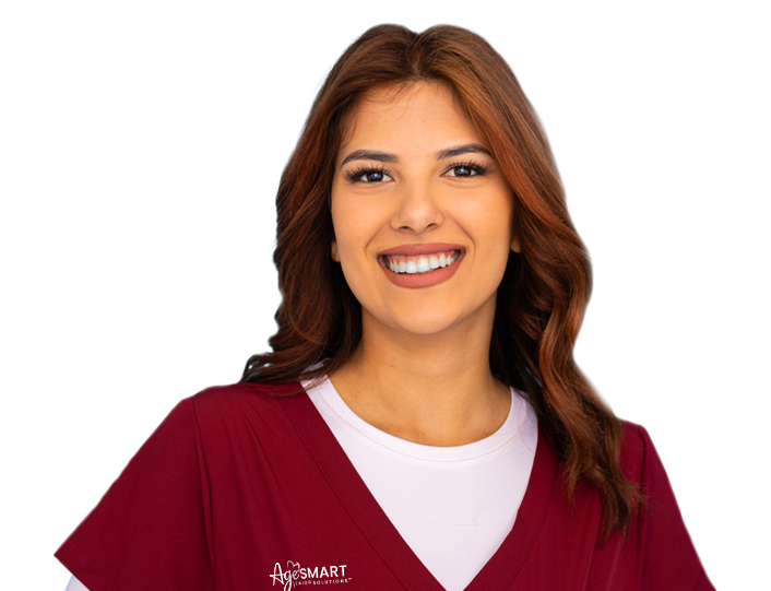 smiling woman in red scrubs with AgeSMART logo