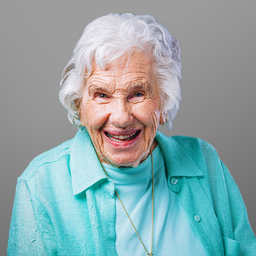 Smiling senior woman representing senior home safety services that support confident aging at home in Salt Lake County