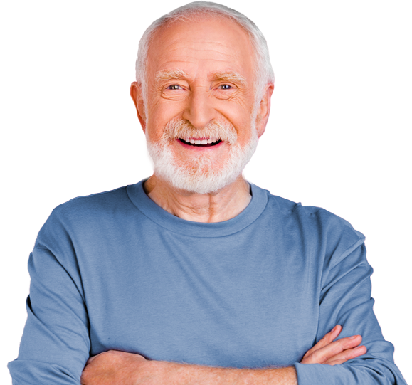 Smiling older man with a white beard wearing a blue shirt and arms crossed